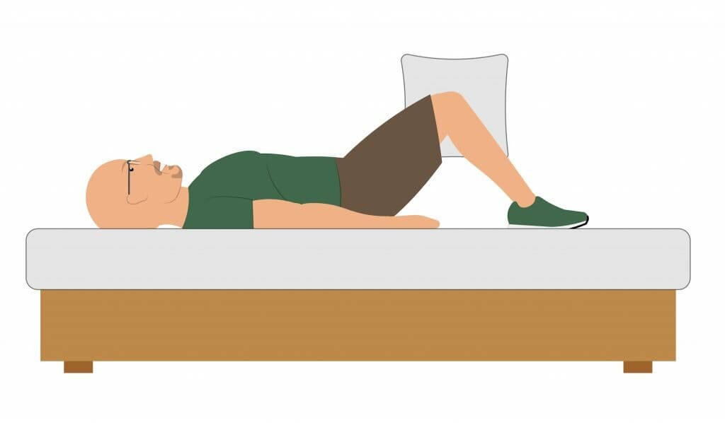 Knee exercise from bed - Laying towel/pillow squeezes step 2