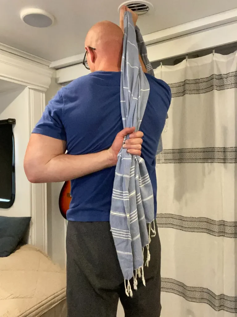 shoulder internal rotation stretch using towel