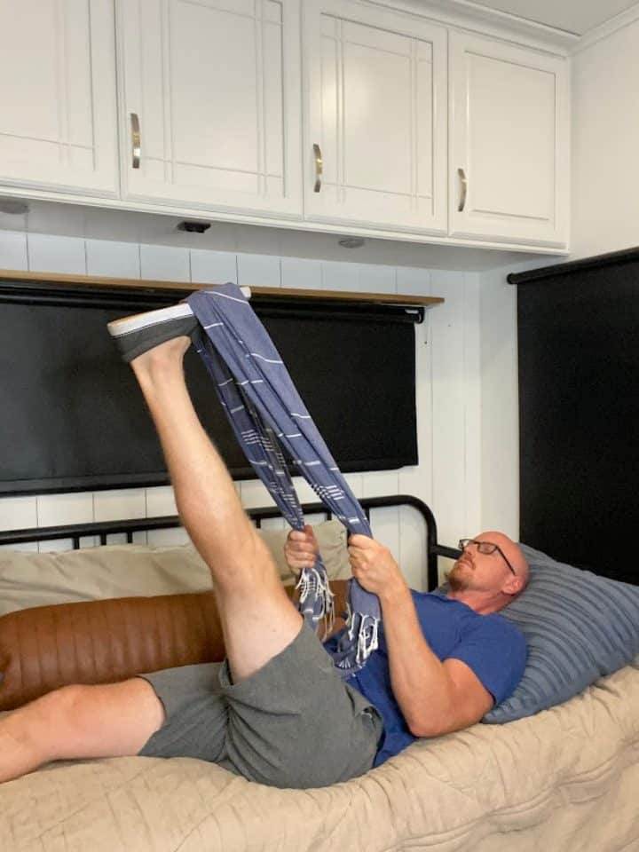 supine hamstring stretch with a strap
