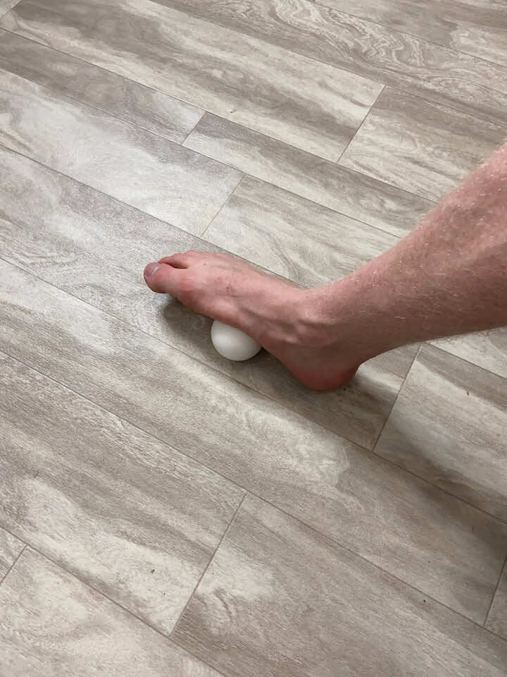 roll bottom of foot with ball